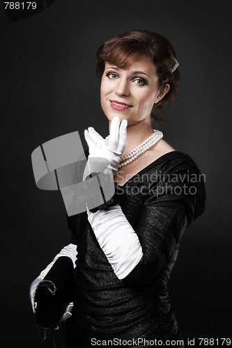 Image of Respectable woman in white gloves