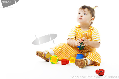 Image of Kid sit and play with toy