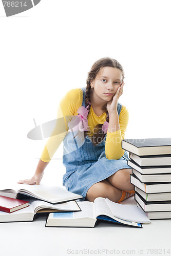 Image of Young sad teenager girl tired from learning