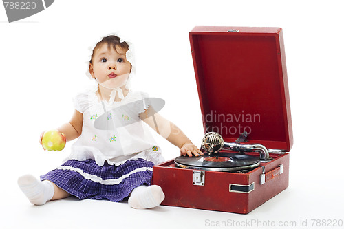 Image of Adorable Toddler girl with gramophone