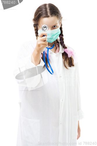 Image of Girl in medical overall examine eyes