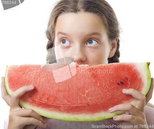 Image of  teenager girl look eating watermelon