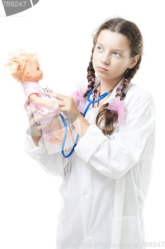 Image of girl play doctor healing the doll