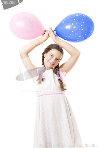 Image of Teenager girl with balloons at her birthday