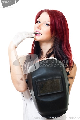 Image of Attractive woman welder