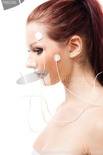 Image of woman with brain sensors on her face