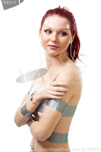 Image of Positive woman with medical sensors on her face