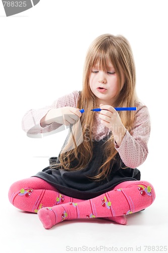 Image of Little girl with felt pen