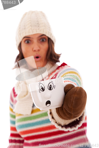 Image of Surprised woman like her hot drink cup