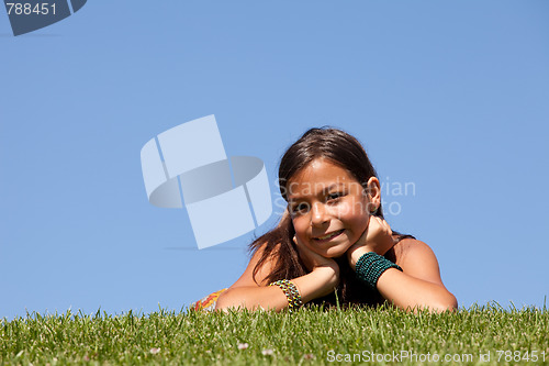 Image of young child on the grass