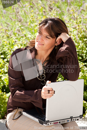 Image of businesswoman working outdoor