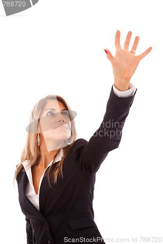 Image of Businesswoman reaching something