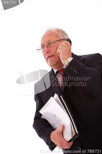 Image of Senior businessman call