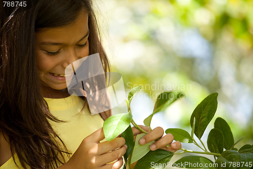 Image of young child enjoying nature