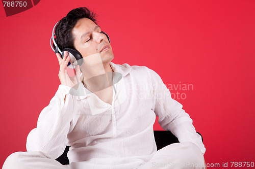 Image of listening music at home