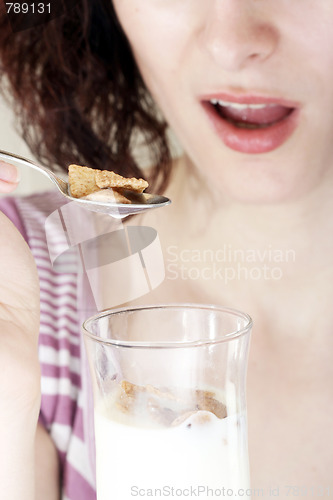 Image of Young people eating milk with cereals