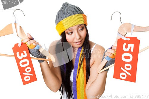 Image of Woman thinking about sale