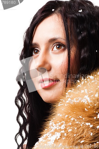 Image of Woman with curly hair with fur
