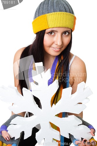 Image of Woman hold huge snowflake