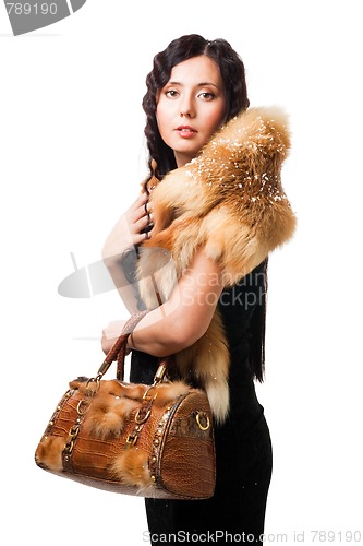 Image of Beautiful woman wear fur with purse
