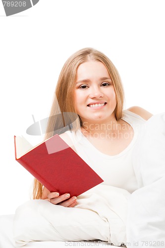 Image of Reading book in bed