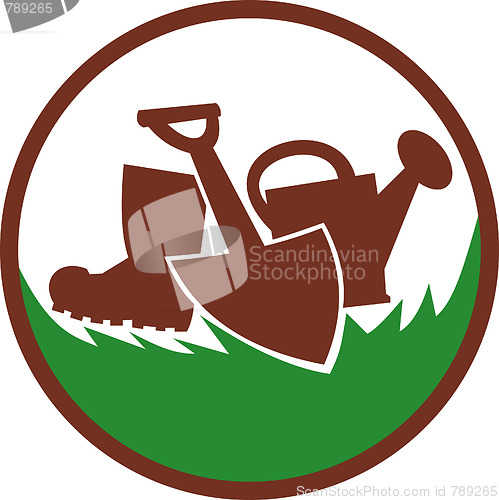 Image of watering can,shovel and gumboots