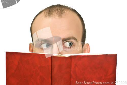 Image of Man hidden behind the book