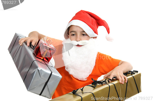 Image of boy with large present at christmas time