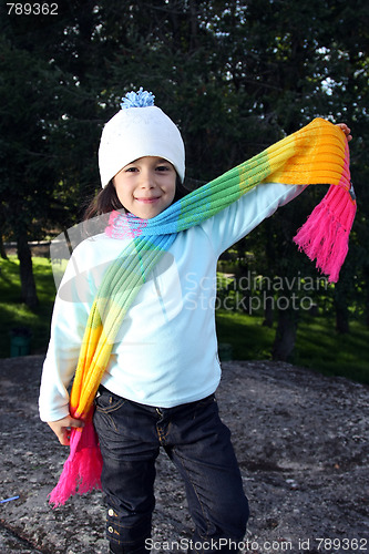 Image of Cute girl in autumn park