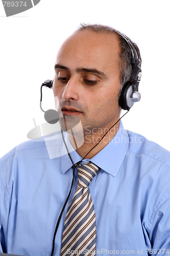 Image of man in a business call center