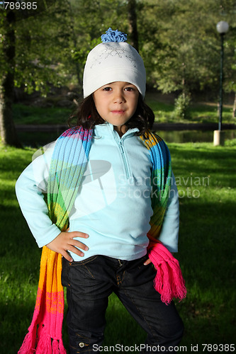 Image of Cute girl in autumn park