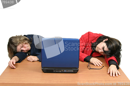 Image of young woman dreaming on laptop