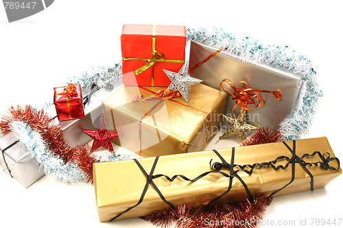 Image of beautiful christmas gifts on white background