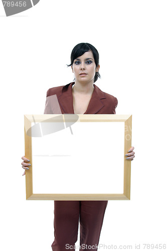 Image of Young woman holding blank board