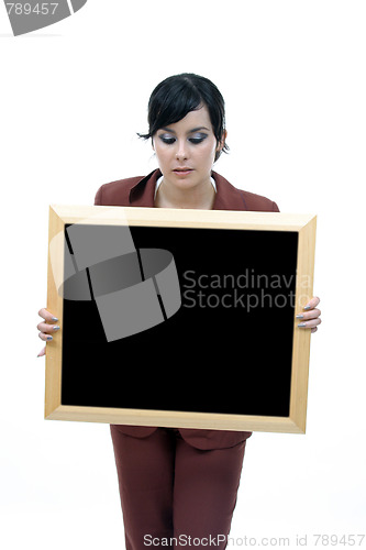 Image of Young woman holding blank board