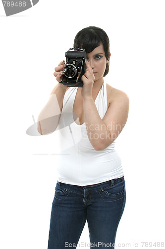 Image of casual young woman photographer