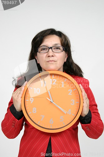 Image of sexy businesswoman with clock, business photo