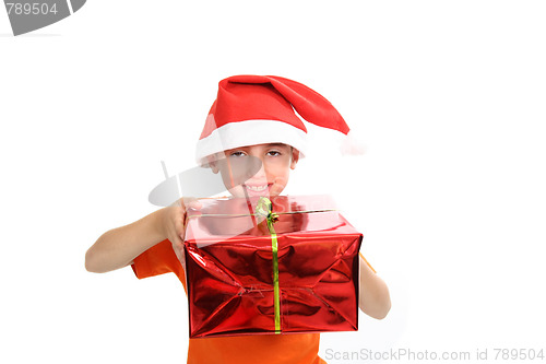 Image of boy with large present at christmas time