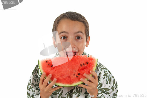 Image of boy eating watermelon isolated on white