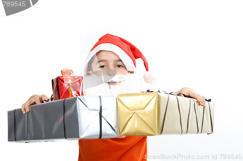 Image of boy with large present at christmas time