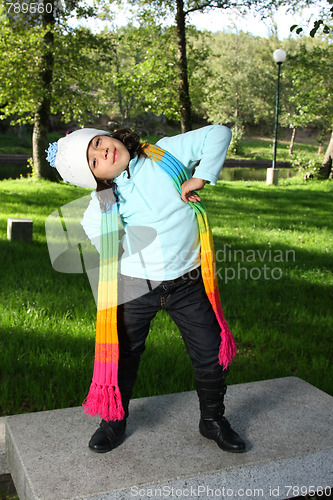 Image of Cute girl in autumn park