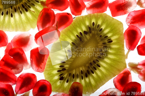 Image of beautiful and fresh pomegranate grains and kiwi