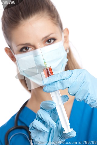 Image of doctor with syringe