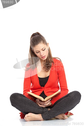 Image of girl reads book