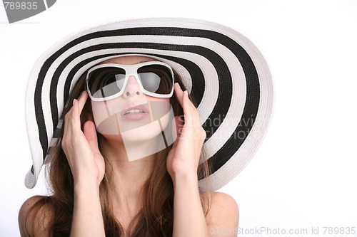 Image of gorgeous girl in striped hat