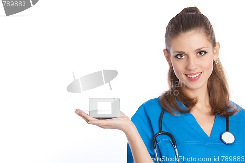 Image of smiling physician with box