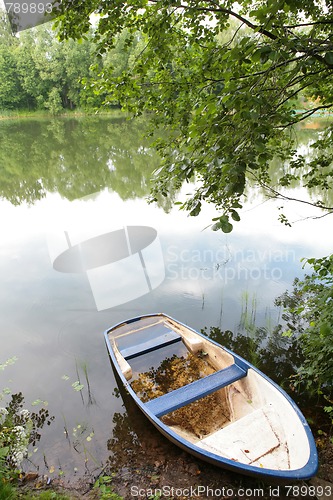 Image of landscape with old boat