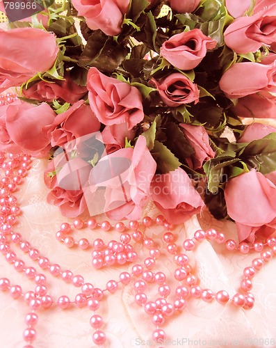 Image of Pink roses with pink beads