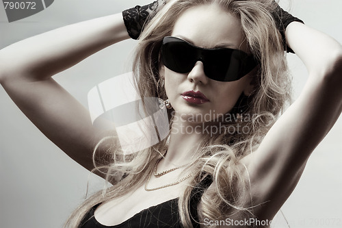 Image of blonde wearing sunglasses