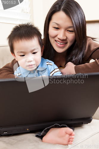 Image of Mother and son with laptop